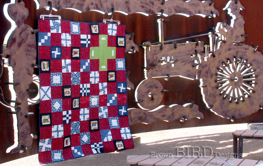 Tractor Quilt #3 features random quilt blocks made out of scraps