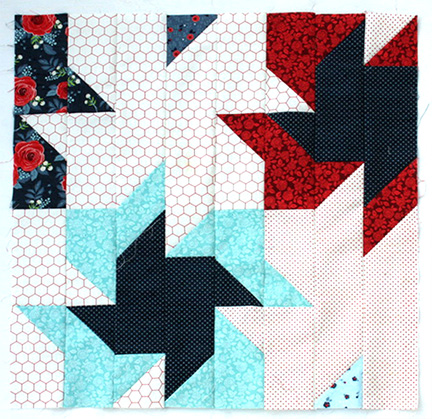 Scrappier Double Pinwheel quilt block 1