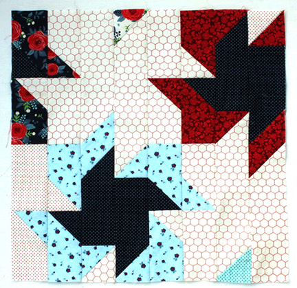 Scrappier Double Pinwheel quilt block 9