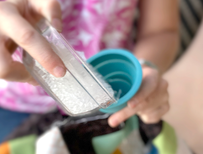 Adding the beads to make a blanket heavy  