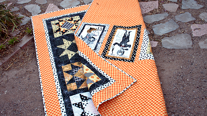 Fun quilt back featuring panels