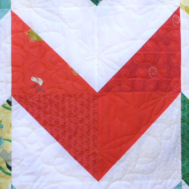 the Take Flight Quilt features large V blocks