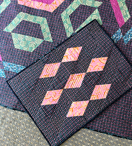 When you buy the Inflorescence Quilt you get a bonus pattern called seven on diamonds