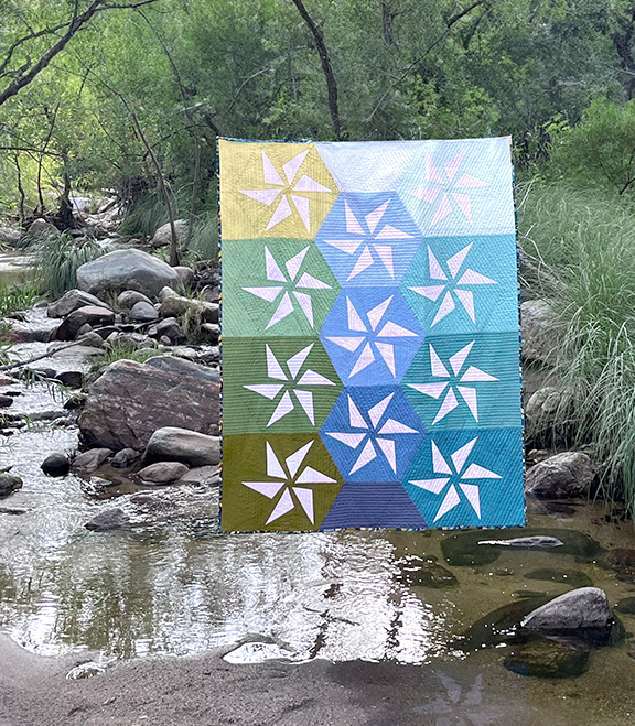 I hung my Nightline Quilt on a rope between two trees over a stream.